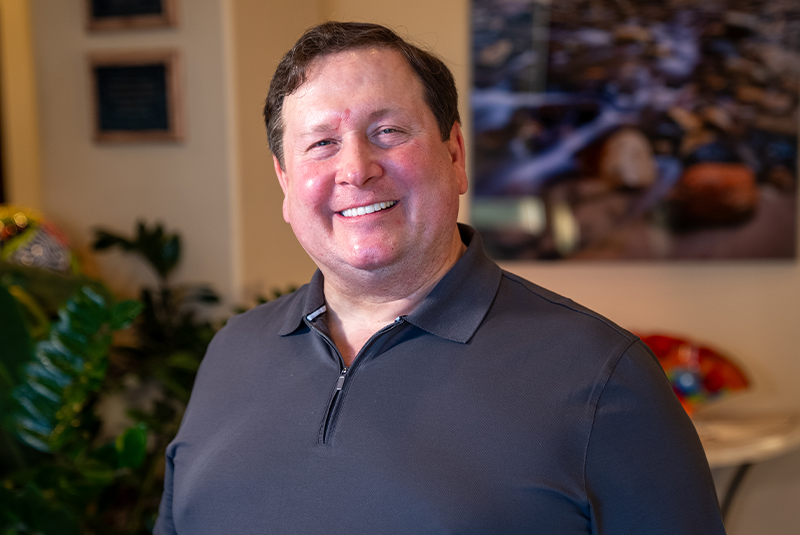 Dr. Najari's patient Brent smiling in the office