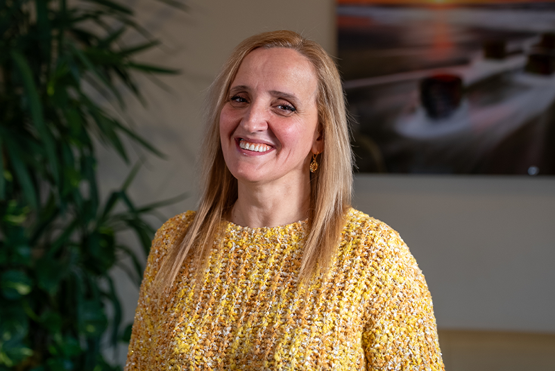 Dr. Najari's patient Hida smiling in office